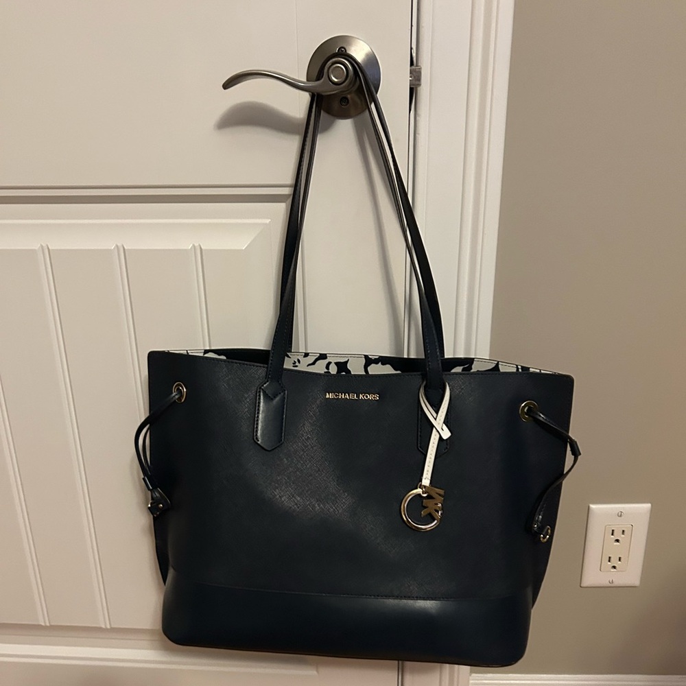 Michael Kors Dark Blue Tote with Gold Accents with matching wallet and wristlet